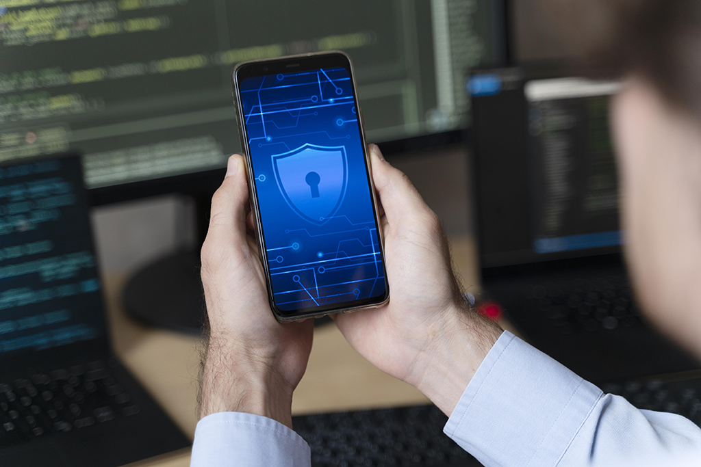 Close up hands holding smartphone with lock